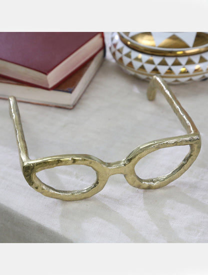 ESCULTURA ANTEOJOS EN ALUMINIO DORADO X8035