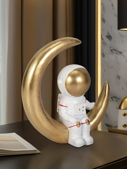 ESCULTURA ASTRONAUTA EN LUNA CRECIENTE 7" X8267